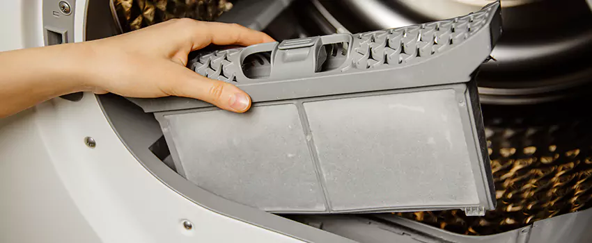 Signs Of A Clogged Dryer Lint Trap in Okemos, Michigan
